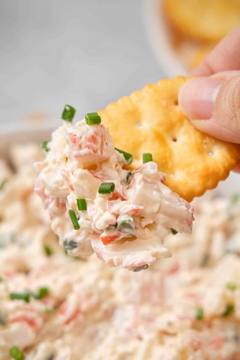 This party-ready Cold Imitation Crab Dip is sensationally bright and loaded with chunks of imitation crab meat. It’s an easy party dip you can mix up with budget-friendly ingredients in just 20 minutes! Cajun Crab Dip Recipe Cold, Homemade Crab Dip, Imation Crab Dip Recipes, Imitatation Crab Dip Recipe Ideas, Fake Crab Meat Recipes Easy, Recipes With Lump Crab Meat, Crab Meat Dip Recipes, Imitatation Crab Recipe Ideas Easy, Imitated Crab Dip