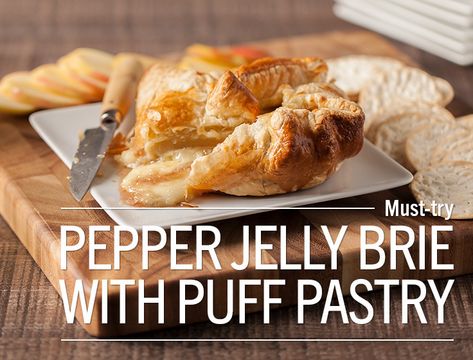 Pepper Jelly Brie in Puff Pastry This classic appetizer features creamy Brie topped with pepper jelly and is wrapped in a flaky pastry crust. Perfect for parties and family gatherings! Pair with your... Pepper Jelly Brie, Baked Brie Puff Pastry, Brie In Puff Pastry, Creamy Brie, Brie Puff Pastry, Red Pepper Jelly, Pastry Appetizer, Hot Pepper Jelly, Brie Recipes