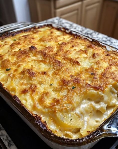 Creamy and decadent Cheesy Scalloped Potatoes perfect for any meal. Layers of tender potatoes smothered in a gooey cheese sauce! #potatorecipe #comfortfood #scallopedpotatoes #cheesygoodness Cheesy Scalloped Potatoes Easy, Scalloped Cheesy Potatoes, Scalloped Potatoes With Cream, Cheddar Scalloped Potatoes, Baked Scalloped Potatoes, Scalloped Potato Casserole, Homemade Scalloped Potatoes, Cheesy Scalloped Potatoes Recipe, Creamy Scalloped Potatoes