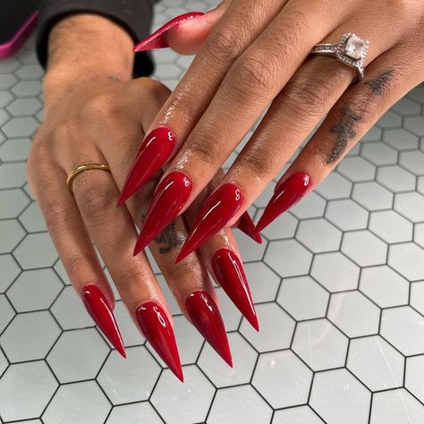 Red Stiletto French Tip Nails, Black Women Red Nails, Red Nails Stiletto Long, Red Stilleto Nails Designs Bling, Red Stilleto French Tip, Red Pointy Nails Stilettos, Red French Stiletto Nails, Red Acrylic Nails Stiletto, Red Pointed Nails