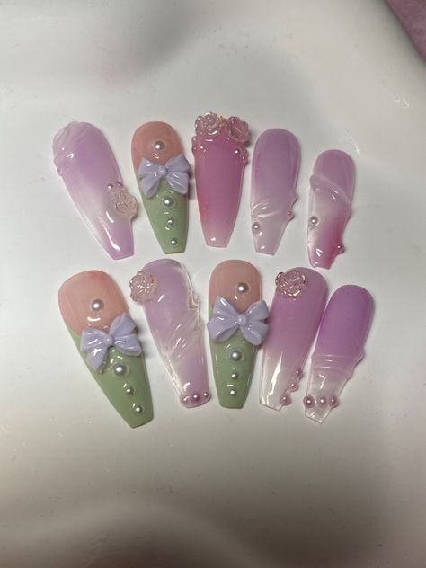 pink and green coquette nails fairy pastel Nail Art Green Purple, Pink And Green Outfit Y2k, Melanie Martinez Trilogy Tour Nails, Sugarplum Fairy Nails, Purple Coquette Nails, Green And Pink Nails Acrylic, Pastel Pink And Green Nails, Lavender And Green Nails, Pink And Green Acrylic Nails