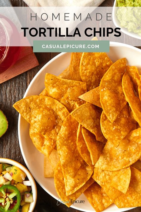 Learn how to make tortilla chips with this classic 3 ingredient tortilla chips recipe. Just slice up corn tortillas, bake or fry them, and serve with your favorite dip! Corn Chips From Tortillas, Tortilla Chips From Tortillas, Home Made Chips Tortilla, Oven Baked Corn Tortilla Chips, Homemade Corn Tortilla Chips, Tortilla Chips From Corn Tortillas, Gluten Free Tortilla Chips, Tortilla Chips Recipe, Tortilla Chip Recipe