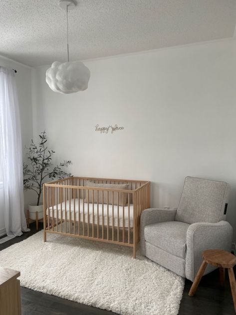 #nurserydecor #nurseryideas Simple Minimalist Nursery, Minimal Neutral Nursery, Beige Crib Nursery, Nursery Dark Floors, Neutral Nursery Aesthetic, Dark Floor Nursery, Apartment Friendly Nursery, Minimalistic Nursery Ideas, Nursery Aesthetic Neutral