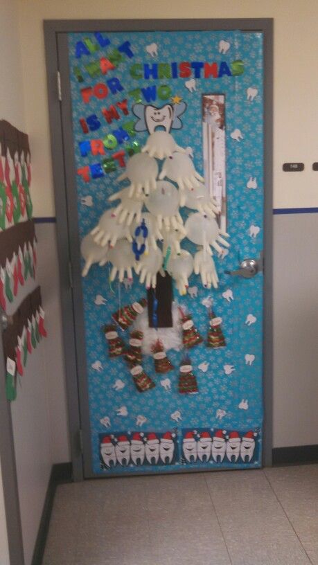 Our awesome dental decorated door. Work Decor, Dentist Office, Christmas Door Decorations, Christmas Door, Bulletin Board, Hanukkah Wreath, Door Decorations, Christmas