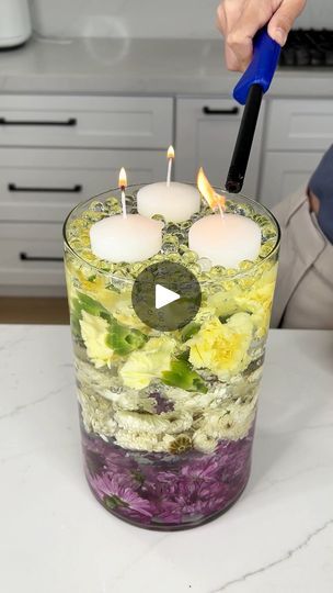 6.4M views · 105K reactions | Easy floral decor | Easy floral decor

I make a centerpiece with flowers and candles for mother's day. | By Justine KameronFacebook Centerpiece With Flowers, Justine Kameron, Age Quotes, Diy Floral Centerpieces, 50th Wedding Anniversary Decorations, Italian Rainbow Cookies, Flowers And Candles, Candle Arrangements, Candle Centerpiece