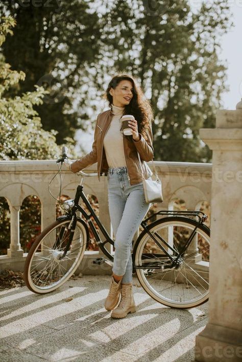 Young woman riding bicycle on autumn day Bike Poses For Women, Cute Bike Riding Outfits, Bicycle Outfits For Women, Photoshoot With Bike, Bike Ride Photoshoot, Autumn Bicycle, Bicycle Photoshoot, Girl Photoshooting With Bike, Riding Bicycle