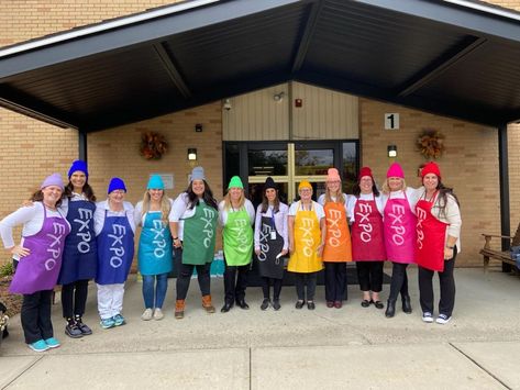 Different colored aprons used as expo marker costumes Expo Marker Halloween Costume Diy, Expo Marker Costume Diy, Group Costume Teachers, Teacher Halloween Costumes Group Of 5, Expo Marker Halloween Costume, Expo Marker Costume, Marker Costume, Teacher Halloween Costumes Group, Halloween Costume Easy