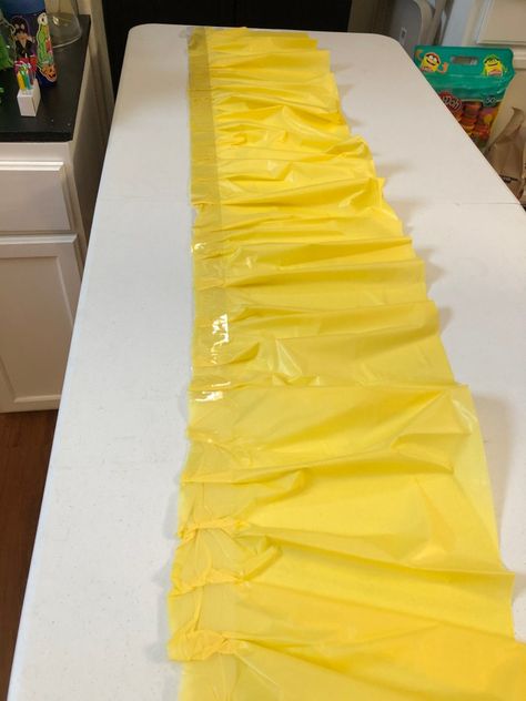 Tablecloth Ideas Party, Parade Float Skirting Ideas, Diy Ruffle Table Skirt, Dollar Tree Tablecloth Garland, Diy Table Arch Stand, Diy Table Cloth Garland, Diy Table Skirt For Party, Diy Encanto Decorations, Cheap Table Cloth Ideas