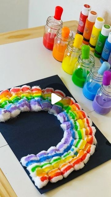 MamaBee👑 on Instagram: "A cute rainbow craft 🌈 

Add some acrylic paint to some water. We used jumbo eyedroppers to drip the paint onto the cotton ball rainbow.

Also, how cute are these tiny little mason jars that I scored at the @dollartree

For more rainbow craft ideas, check out…

@mamasbusybees 
@magicaladventuresandmoreco 
@chels2983 
@threepeasfinds 
@sweetpinklemons 
@sincerely.schwartz 
@beagsandbubs 
@playandread.together 
@luckylittlepennycrafts 
@frassatihomeschooling 
@littlelovebox_ny 
@megjohnsonfamily

Loop hosted by @motherhoodcreatives #motherhoodcreatives

#toddlercrafts #toddlerartsandcrafts #rainbowart #craftsforkids #finemotorskillsactivities #rainbow #stpatricksdaycrafts #artfortoddlers #artoftheday #toddleractivities #activitiesfortoddlers #activitiesforkids #insp Senior Preschool Activities, Cotton Balls Crafts, Rainbow Activity Preschool, Rainbow Art For Toddlers, Rainbow Craft Preschool, Rainbow Art Preschool, Rainbow Painting For Kids, Rainbow Activities Preschool, Cotton Ball Activities