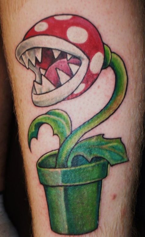 Mario Bross Flower tattoo Nintendo Tattoos, Nerd Tattoos, Nintendo Tattoo, Satoru Iwata, Video Game Tattoos, Mario Tattoo, Tattoo For Boyfriend, Piranha Plant, Gamer Tattoos