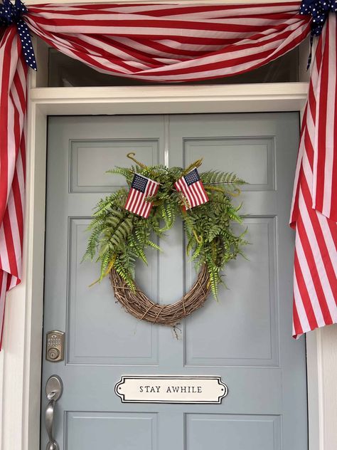 How To Hang Bunting On Porch, Patriotic Bunting Porch, Patriotic Outdoor Decorations, Front Door 4th Of July Decor, Americana Front Porch, July 4th Front Porch Decorating Ideas, Forth Of July Porch, Flag Bunting On House, July 4 Decor