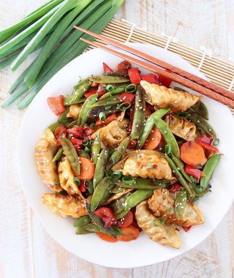 Chicken Potsticker Stir Fry Recipe - WhitneyBond.com Pot Sticker Stir Fry Recipe, Potsticker Stir Fry Recipe, Potsticker Filling, Potsticker Stir Fry, Simple Stir Fry Sauce, Chicken Potstickers, Simple Stir Fry, Chinese Meals, Potstickers Recipe