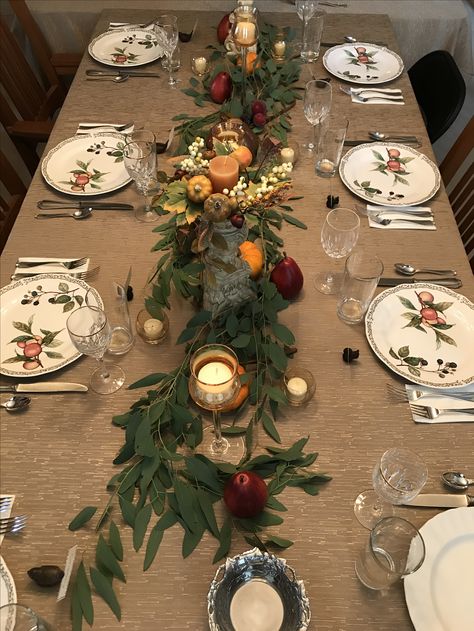 Thanksgiving Centerpiece with fresh Eucalyptus leaves, pumpkins, red pears, and votives. Table Decor With Eucalyptus, Votive Centerpieces, Red Pears, Simple Thanksgiving Table Decor, Simple Table Decorations, Simple Thanksgiving Table, Simple Thanksgiving, Thanksgiving Pictures, Fresh Eucalyptus