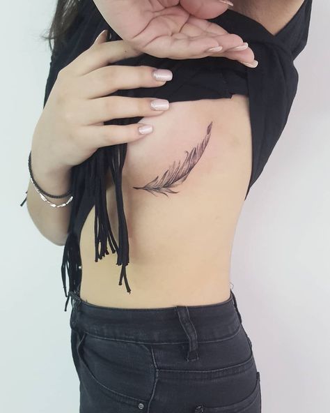 Feather Tattoos On Side Ribs, Feather Tattoos Underboob, Feather Underboob Tattoo, Tattoo Sternum, Underboob Tattoos, Coordinates Tattoo, Lotus Tattoo Design, Ribcage Tattoo, Underboob Tattoo