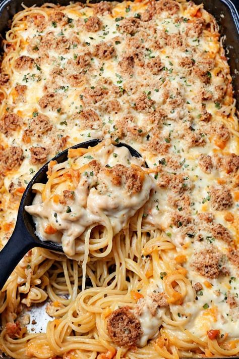 Cheesy Chicken Spaghetti Casserole Recipe

Ingredients

- 8 ounces spaghetti
- 2 cups cooked chicken, shredded
- 2 cups shredded cheddar cheese
- 1 cup cream of mushroom soup
- 1 cup milk
- 1/2 cup diced bell pepper
- 1/2 cup diced onion
- 1 teaspoon garlic powder
- 1/2 teaspoon salt
- 1/4 teaspoon black pepper
- 1/2 cup breadcrumbs (optional for topping)

Full Cooking Instructions on... Cheesey Chicken Spaghetti Casserole, Chickenetti Casserole, Cheesy Chicken Spaghetti Casserole, Cheese Tortellini Soup, Spaghetti Casserole Recipe, Chicken Spaghetti Casserole, Cheesy Chicken Spaghetti, Chicken Shredded, There's No Tomorrow