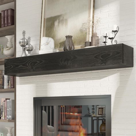 PRICES MAY VARY. Sturdy All-Wooden Mantel For Fireplace — Woodlands wood mantles for over fireplace are made from eco-friendly pine, providing exceptional durability and long-lasting quality. This 48 inch shelf for wall brings a warm and inviting centerpiece to your fireplace or the fireplace surround. Heat Shield — The space above Woodlands weathered black floating shelves 48 inches is vulnerable to heat and smoke. This non combustible fireplace mantel sized at 48 x 8 x 5 inch, offers crucial p Mid Century Modern Fireplace Mantle, Floating Mantle Under Tv, Black Fireplace Decor, Mantel For Fireplace, Rustic Wood Mantle, Live Edge Mantle, Black Fireplace Mantel, Wood Mantles, Mantel Installation