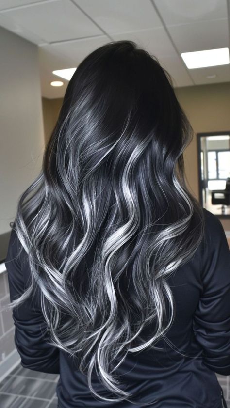 Achieve a breathtaking balayage look with striking black highlights and shimmering silver hair color! This trendy style adds depth and dimension, creating a beautiful contrast that is perfect for any occasion. Our premium hair extensions make it easy to sport this fabulous color. Enjoy a special 22% off for Halloween with code P22! Elevate your hair game today and dazzle everyone with your stunning new style! #Balayage #BlackHighlights #SilverHair #HairExtensions #HairColorInspo Black Hair With Silver Lowlights, Long Black And Silver Hair, Black Lowlights In Light Brown Hair, Black Hair With Streaks Of Blonde, Black Hair Silver Extensions, Black Hair Platinum Balayage, Black Hair With Dark Grey Highlights, Black To Grey Balayage, Black With Low Lights Hair