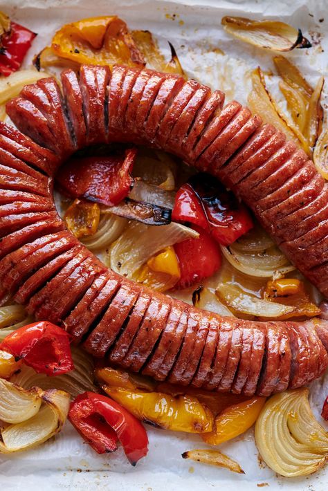 Hasselback Kielbasa Recipe - NYT Cooking Hasselback Smoked Sausage, Kielbasa Recipes Oven, Kielbasa In Oven, Hasselback Sausage, Hasselback Kielbasa, Nytimes Cooking, Kielbasa Recipe, Real Burger, Rotisserie Chicken Salad