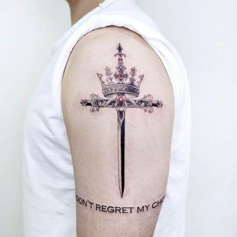 Crown and Sword Tattoo On Shoulder Cross With Crown Tattoo, Tatoo Crown, Simple Crown Tattoo, Cross With Crown, Minimalist Christian Tattoo, Crown Tattoo Men, Christian Tattoo Ideas, Jing Y Jang, Chakra Tattoo