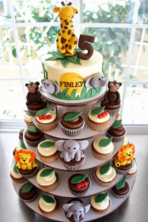 JUNGLE CAKE & CUPCAKE TOWER by Half Baked Co. #jungle #safari #cake #cupcakes Safari Birthday Cupcakes, Pastel Safari, Jungle Theme Birthday Party, Jungle Thema, Gateau Baby Shower, 2nd Birthday Party For Girl, Animal Birthday Cakes, Wild Birthday Party, Cupcakes For Boys