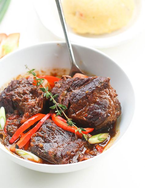 Jamaican Brown Beef Short Ribs Stew- You only need 10 minutes prep to make this rich, fragrant, braised short ribs stew and its fall off the bone delicious! If you want something that is bad to the bone, finger licking good, insanely delicious, impossible to mess up, with very little prep then this is it!!! … Jamaican Short Ribs, Jamaican Short Ribs Recipe, Jerk Beef Short Ribs, Jamaican Jerk Beef Short Ribs, Jamaican Beef Recipes, Beef Short Ribs Stew, Short Ribs Stew, Beef Rib Stew, Jamaican Beef Stew