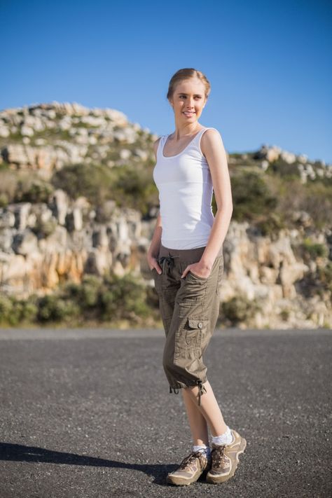 Smiling woman with hands in pockets posing Premium Photo Hands In Pockets Pose Drawing, Hands In Pockets Pose, Hand In Pocket, Hands In Pockets, Walking Poses, Body References, Action Pose Reference, Art Composition, Smiling Woman