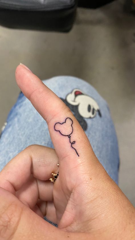 Mickey Finger Tattoo, Matching Small Disney Tattoos, Abstract Disney Tattoo, Disney Tattoos Hand, Dainty Disney Tattoos For Women, Mom And Daughter Tattoos Matching Disney, Disney World Tattoo Ideas, Disney Sibling Tattoos, Disney Tattoos Small Meaningful