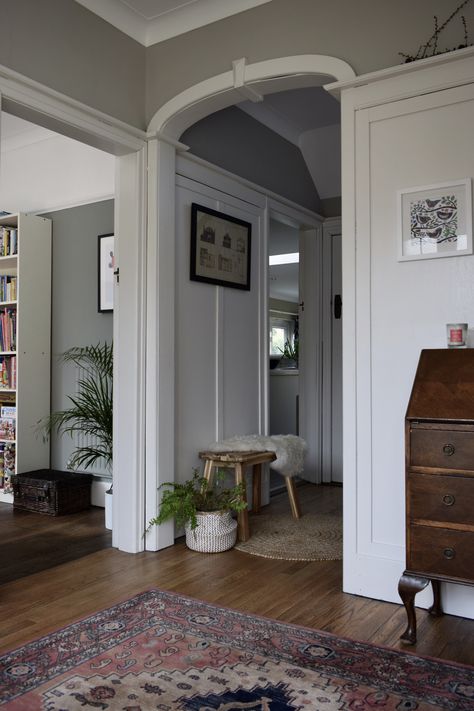 Hallway wood panelling painted in Farrow & Ball Strong White with Purbeck Stone on wall above, vintage with modern touches Hallway Wood Panelling, Farrow Ball Strong White, Entrance Hall Modern, Hallway Panelling, Interior Hallway, 2023 Decor, Wood Panelling, Narrow Entryway, Painting Wood Paneling