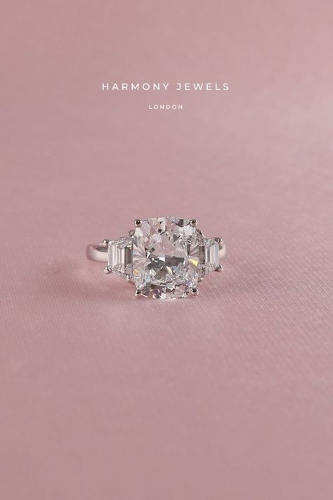 ✨Holy Trinity✨ Such a gorgeous Trilogy engagement ring featuring a massive Cushion Centre Diamond with Trapezoid sides 💍💫 Would you wear a beauty like this? 😍 Whatever your budget, get in touch and find how we can make the perfect piece for you! 📩 Cushion Trilogy Engagement Ring, Trilogy Engagement Ring, Cushion Cut Diamond, Bespoke Engagement Ring, Stunning Engagement Ring, Right Hand Rings, Beautiful Engagement Rings, Cushion Cut Diamonds, Holy Trinity