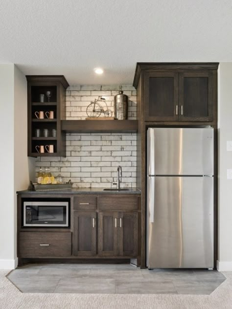 Wet Bar Ideas Full Fridge, Finished Basement Ideas With Kitchen, Small Kitchen Ideas For Basement, Very Small Family Room Ideas, Small Basement Bar Ideas Rustic, Makeup Counter Ideas, Wet Bar Kitchenette, Knotty Alder Cabinets With Brick Backsplash, Wet Bar Ideas With Refrigerator