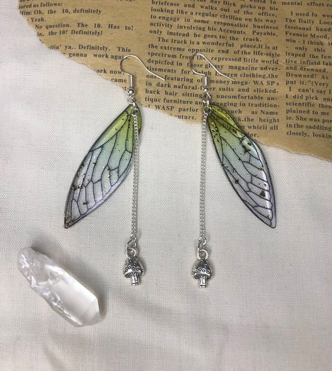 Beautiful green fairy wing earrings  ️  With gold detailing , Sliver chain and mushroom charm 🍄  Sterling silver hooks  Handmade to order  Free postage  If you have any questions please don't hesitate to message 🌿 Mushrooms Aesthetic, Green Fairy Wings, Cottage Forest, Fairy Wing Earrings, Grunge Earrings, Cottagecore Earrings, Cottagecore Jewelry, Core Cottage, Fairycore Fairy