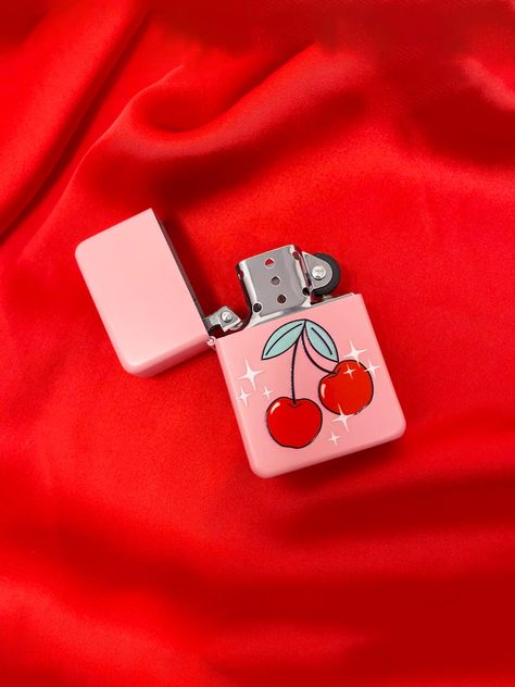 You'll cherry-ish this sweet little lighter! 🍒 Perfect for lighting cigarettes, candles, or whatever else you need a fire for! This lighter is refillable, but lighter fuel is not included. It ships empty and needs to be filled with lighter fluid to ignite!The casing is high-quality metal. You can use this baby over and Lighters Aesthetic, Lighter Aesthetic, Lil Cherry, Refillable Lighter, English Project, Cool Lighters, Puff Puff, Burning Love, Lighter Fluid