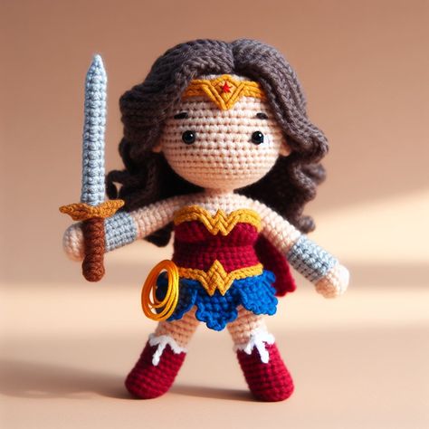 Craft a powerful Wonder Woman Amigurumi with this inspiring pattern, perfect for creating a handmade tribute to the iconic superheroine! Wonder Woman Crochet Pattern, Crochet Wonder Woman, Crocheted Halloween, Batman Amigurumi, Yarn Toys, Superhero Dolls, Disney Crochet Patterns, Fingerless Gloves Crochet Pattern, Crochet Toys Free