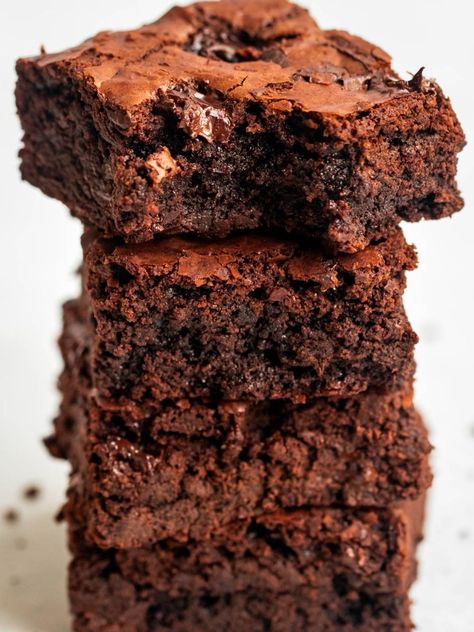 Stack of brownies with a bite missing from the top brownie. Best Ever Chocolate Cake, Choc Ganache, Simple Sugar Syrup, Moist Brownies, Fudgy Brownie Recipe, Chocolate Babka, Chocolate Crinkle Cookies, Brownie Toppings, Chocolate Crinkles