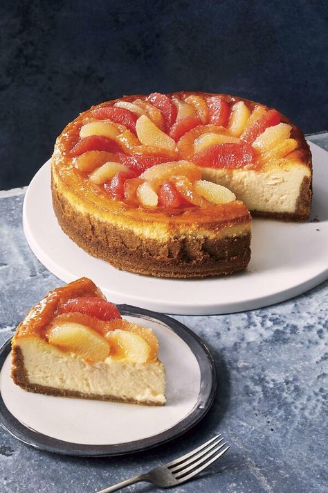 Grapefruit Cheesecake | "A rainbow of in-season grapefruit adds a bright not to this rich, creamy cheesecake. To keep the cheesecake from getting soggy, arrange the citrus on top just before eating. If you have leftover cheesecake, remove the grapefruit and store separately in the refrigerator." #cake #cheesecake #cheesecakerecipes #dessertrecipes #baking #cake #dessert #grapefruitrecipes Grapefruit Cheesecake, Christmas Cheesecake Recipes, Southern Dinner Recipes, Cheesecakes Recipes, Apple Autumn, Grapefruit Recipes, Creme Brulee Cheesecake, Meal For One, Lithuanian Recipes