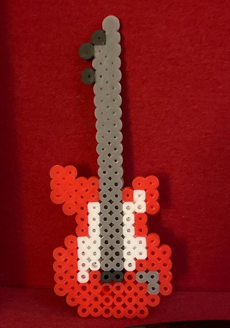 Red and white guitar made out of perler melty beads handmade by me. Approximately 5x2 inches. Comes with free gifts. Dr Pepper Perler Beads, Melted Beads, White Guitar, Beads Patterns, Perler Crafts, Melty Beads, Melting Beads, Perler Bead Art, Dr Pepper