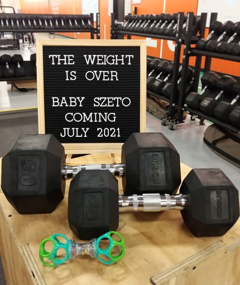 Dumbbells, baby rattle, word board, gym, baby announcement Weight Gender Reveal Ideas, Workout Gender Reveal Ideas, Deadlift Gender Reveal, Powerlifting Gender Reveal, Weights Gender Reveal, Fitness Gender Reveal Ideas, Weightlifting Gender Reveal, Crossfit Gender Reveal Ideas, Crossfit Baby Shower Ideas