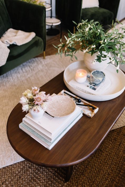 Dark wood coffee table styled with light neutral accessories Round Dark Coffee Table, Living Room Dark Wood Coffee Table, Hygge Coffee Table Decor, Coffee Table Decor Dark Wood, Cream Couch Dark Wood Coffee Table, Boho Coffee Table Styling Wood, Brown Office Table Decor, Apartment Decor Dark Wood, Sofa Table Decorations Ideas