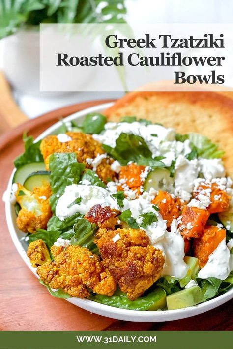 These Roasted Cauliflower Bowls are an incredible Mediterranean-inspired warm salad with ample creamy Greek Tzatziki sauce, sliced cucumbers, avocados, and feta. A vegetarian meal that's so good, you will make it often! Cauliflower Bowls, Greek Tzatziki Sauce, Greek Tzatziki, High Potassium Foods, Oven Roasted Cauliflower, Sweet Potato Bowls, Feta Cheese Salad, Warm Salad, Salad With Sweet Potato