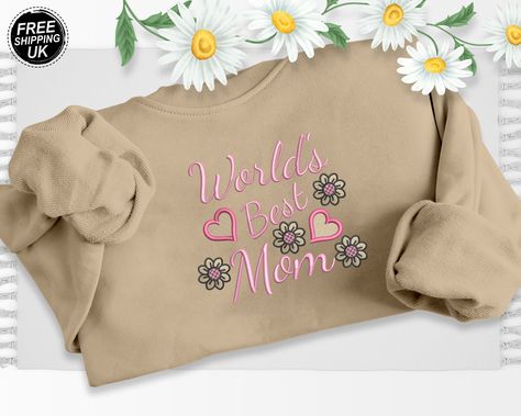 Embroidered Mom Sweater, World Best Mom Mothers Day Sweatshirt, Mama Embroidery Jumper, Special Gifts for Mom, Birthday Presents for Granny Take advantage of our current limited-time offer: a generous 70% discount on our entire stock. Don't let this opportunity slip away to gift your loved ones something special. Your thoughtful gestures will undoubtedly create lasting memories for them. Our company specializes in delivering top-quality personalization and customization services for clothing products and accessories. We have the expertise to digitize your designs, logos, pictures, and ideas onto various apparel items, creating an appealing final product. Product Specifications: - 50% Polyester 50% Cotton - Reactive Dyed - Set in Sleeve - Lycra Ribbed Cuffs, Welt & Neck - Twin Needle Stitch Mom Sweaters, Embroidery Jumper, Mama Embroidery, Thoughtful Gestures, Gifts For Mom Birthday, Special Gifts For Mom, Minimalist Shirts, Mom Sweater, Beste Mama