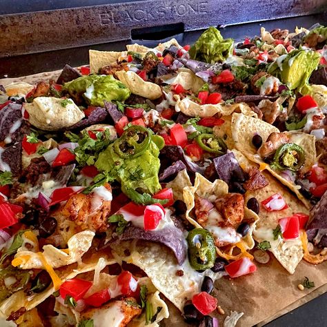 Loaded Nachos – Blackstone Products Blackstone Nachos Supreme, Nachos On The Blackstone, Nachos Blackstone, Flatrock Recipes, Blackstone Nachos Recipe, Nachos On Blackstone Griddle, Blackstone Nachos, Blackstone Cooking, Beach Recipes