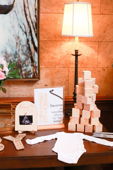 Dreamy baby shower, hosted at a historical mansion in Tulsa, Ok. Decorate a block for the baby #babyboy #babyshowerthemes #neutral #baby #babyshowerdecor #tables #tablescape #historical #formal #wedding #weddingideas #weddingplanning #balloons #babyshowergame Baby Block Decorating Station, Decorate A Block Baby Shower Activity, Baby Block Centerpieces, Decorate Baby Blocks, Decorate A Block Baby Shower Game, Historical Mansion, Baby Shower Blocks, Decorate A Block, Ethereal Decor