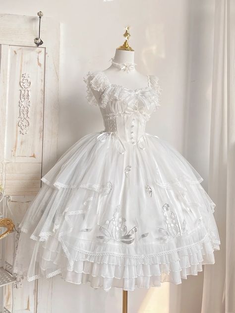 A stunning Lolita JSK that embodies the essence of classic fairy tales. This dress features a beautifully structured basque waist that accentuates your figure, the overlay is delicately embroidered with Lily of the Valley motifs, adding an element of delicate sophistication. The back of the dress is designed with a combination of shirring and lace-up, ensuring a comfortable and adjustable fit for all body types.   	 		 			Size 			S 			M 			L 			XL 		 		 			Bust Lily Of The Valley Embroidery, Lady Aphrodite, White Lily Of The Valley, Cute Kawaii Outfits, Creepy Cute Fashion, Killstar Clothing, Quinceanera Themes Dresses, Basque Waist, Pretty Quinceanera Dresses