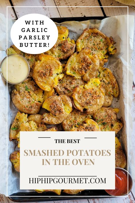 smashed potatoes piled onto a parchment lined baking sheet with 2 dipping sauces Smashed Golden Potatoes In Oven, Smashed Golden Potatoes, Oven Smashed Potatoes, Golden Potato Recipes, Smash Potatoes, Potatoes Oven, Parsley Butter, Golden Potatoes, Smashed Potatoes Recipe