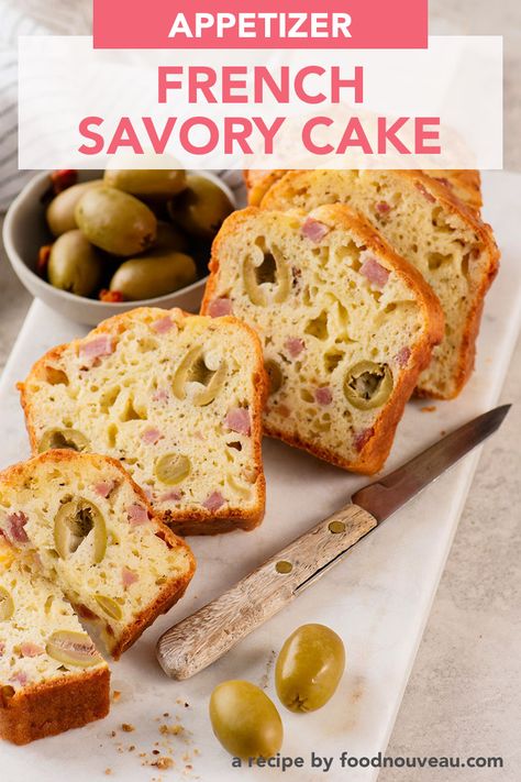 This French savory cake is filled with scrumptious, savory ingredients: salty ham, aged cheese, and briny olives. A must for a francophile happy hour! Savory Cake, Savory Cupcakes, French Appetizers, Comte Cheese, Appetizer Platter, Cake Recipes At Home, Aged Cheese, Appetizer Platters, Olive Recipes