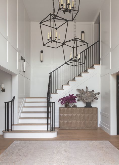 Chandelier In Stairwell, Foyer Paneling, 2 Story Entryway, Stairway Lighting Ideas, Staircase Lights, Stairway Ideas, Staircase Lighting Ideas, Entryway Stairs, Best Neutral Paint Colors