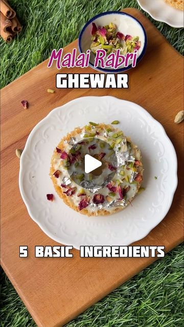 @nehadeepakshah on Instagram: "Malai Ghewar , this dish will make you feel soooo proud. It is actually very easy to make. Just follow the measurements. 

Fun Fact One of the top restaurant in the world uses ghewar as a base for a mushroom appetizer

For - 5 Small Ghewars (4 Inch Diameter)

2 tbsp Ghee
2 Ice Cubes
1/2 cup + 1 tbsp / 75 g Maida
1 tsp Besan
250 ml chilled water
1 & 1/2 tsp Lime Juice (Add it to the batter)
Oil / Ghee or Vanaspati for frying

Sugar Syrup - Make 1 taar ka syrup with Kesar & Elaichi
Some Nuts & Rabri 

- After rubbing the ghee with flour, you can blend it in the mixie to get a smooth batter. It is a lot easier & efficient
- The frying fat should be medium temperature.
- Use a squeezy bottle for pouring the batter & it should fall drop by drop or in one stream. P Mushroom Appetizer, Mushroom Appetizers, Quick Recipes Snacks, Sugar Syrup, Indian Sweets, Top Restaurants, Special Recipes, Ice Cubes, Ghee