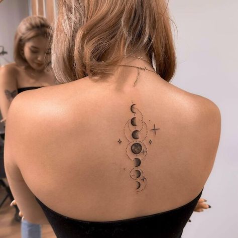 Moon Tattoo Moon Phases Tattoo Spine, Spine Tattoo Designs, Shark Tooth Tattoo, Blue Flower Tattoos, Back Tattoo Women Spine, Tattoo Spine, Black Dragon Tattoo, Cosmic Tattoo, Floral Back Tattoos