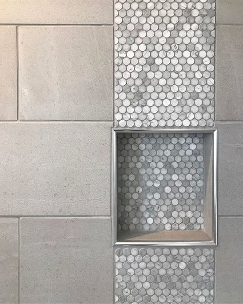 Who doesn't love a marble penny round accent stripe?? This is one of our new faves, matched with the tried-and-true Slavina light grey in 12x24. #spechouse #whoknew?? #newhome #tile #porcelain #marble #calacatta #carrera #niche #shower #grey #schluter #dallaterra #theshowroom #shoplocal #localbuild #cumberland #mapei #grout Showroom Flooring, Bathroom Flip, Tile Shower Floor, Mapei Grout, Marble Calacatta, Girl Bathroom, Bathroom Niche, Shower Wall Tile, Penny Round Tiles