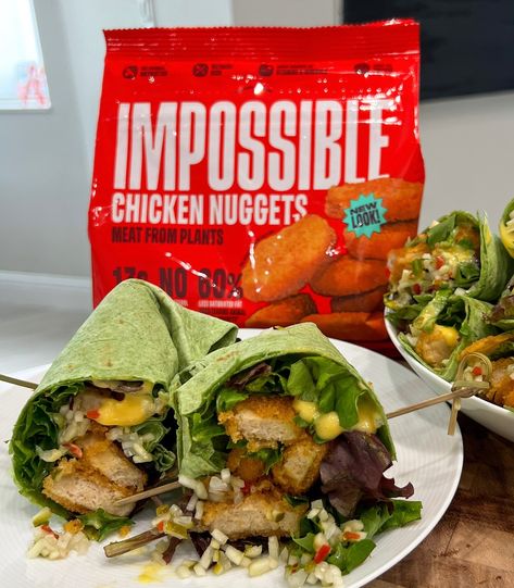 IMPOSSIBLE WRAP 🌯. I’m partnering with @impossible_foods, and we’re bringing you a quick summer lunch hack! Impossible Chicken Nuggets from Plants are baked and crispy in only 11 minutes. They fit perfectly in wraps, sandwiches, or tossed on top of a salad. Since they’re kept frozen, you can always have them on hand for a quick snack. They can be heated in the oven, air fryer, or microwave, making them very convenient. You can find these delicious nuggets at Whole Foods! Comment RECIPE to ... Oven Air Fryer, Summer Lunch, Quick Snack, Quick Snacks, Chicken Nuggets, Whole Foods, The Oven, Air Fryer, Whole Food Recipes